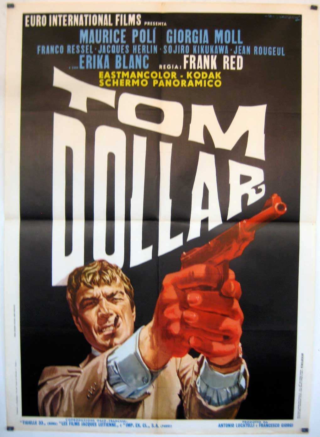 TOM DOLLAR